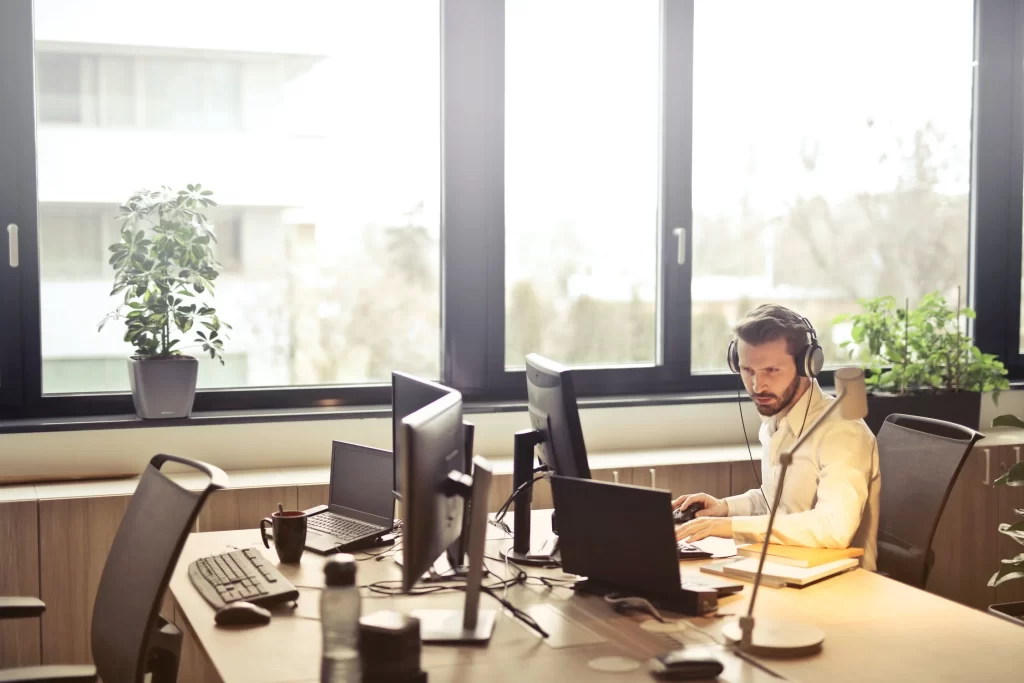 Man working on computer. You can worship God with your work 