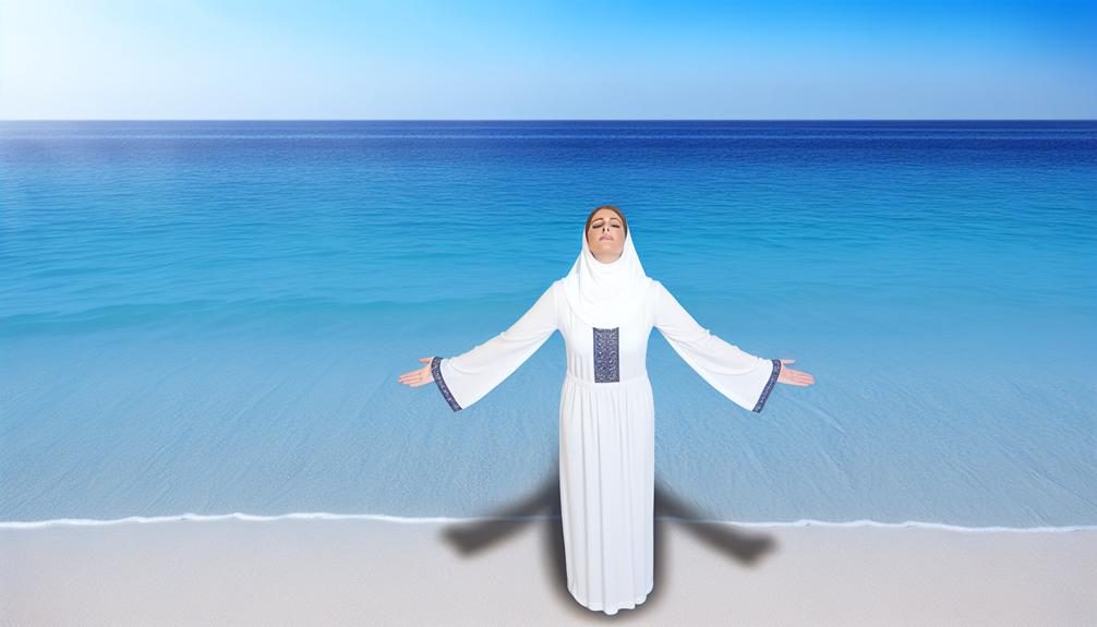 woman by the beach with outstretched arms